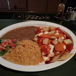 Mexican enchiladas. Center of tortillas had cold, firm, unmelted cheese.Beans were soupy. Rice over cooked. Carrots were al dente.