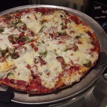Capparelli's On Main - Deluxe pizza with jalapeno - Italian Near Me - San Antonio, Texas Capparelli's On Main - Deluxe pizza with jalapeno - Italian Near Me - San Antonio, Texas