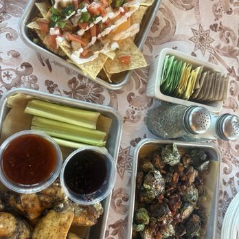Southern Tail Brewing - Chicken wings  Brussels sprouts  Nachos - Cocktail Bars Near Me - Little Rock, Arkansas