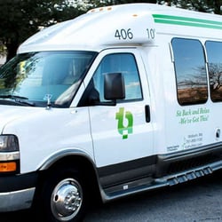 TransAction Associates - 13 Passenger Luxury Limo Coach.