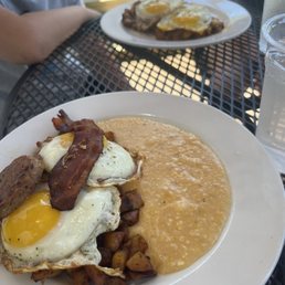 Grits, eggs, bacon, potatoes, patio seating Grits, eggs, bacon, potatoes, patio seating