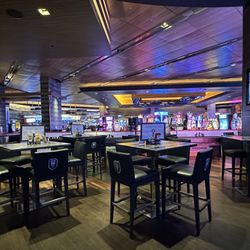 Knight Time Hockey Bar - One of the many seating areas with very comfortable chairs and lots of TVs around