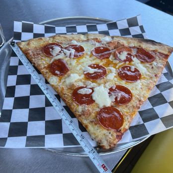 Yonx Pizza Bar - That is a single slice of pizza delicious very thin - Pizza Near Me - Wylie, Texas Yonx Pizza Bar - That is a single slice of pizza delicious very thin - Pizza Near Me - Wylie, Texas