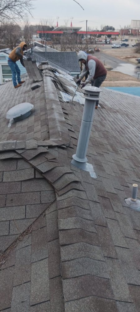 Slide of Pacific Roofing