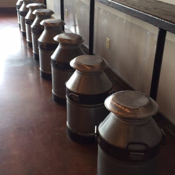 Toosso Pakistani Kitchen - Old cans used to supply milk in Pakistan! - Pakistani Near Me - Sterling, Virginia