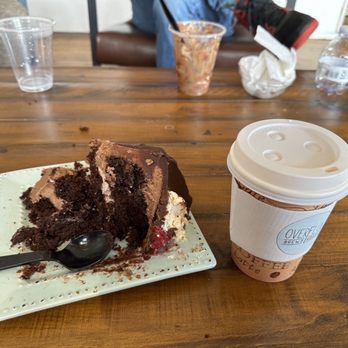 Oflow - The most delicious Layered Chocolate Raspberry Cake served in generous shareable triangle shaped slices. - Bakeries Near Me - Murfreesboro, Tennessee