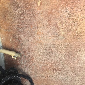 Artcrete Designs - Hard to see well, but the sealer is cloudy and looks like this in many areas all up and down the driveway. - Masonry/Concrete Near Me - Austin, Texas