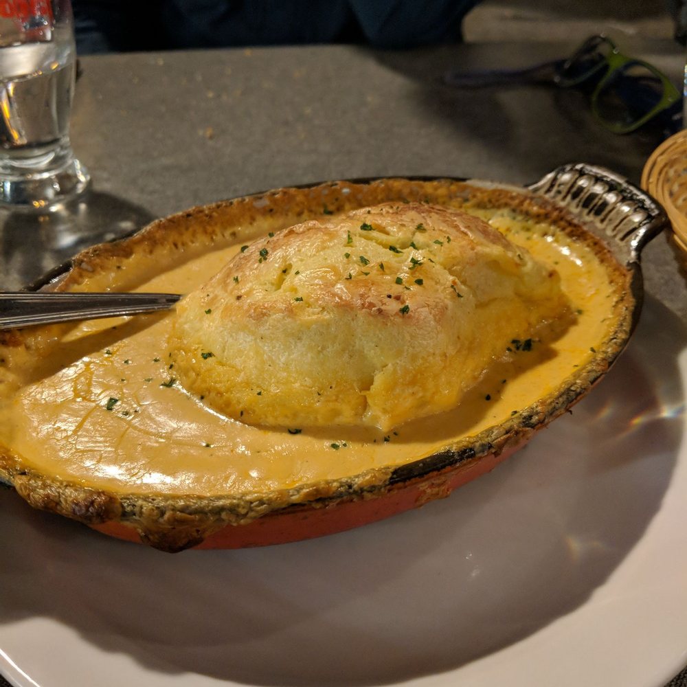 Quenelle smothered in seafood sauce.