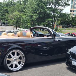 The Phantom. Like no other. In a drop top. I think those are 24s is sitting on.