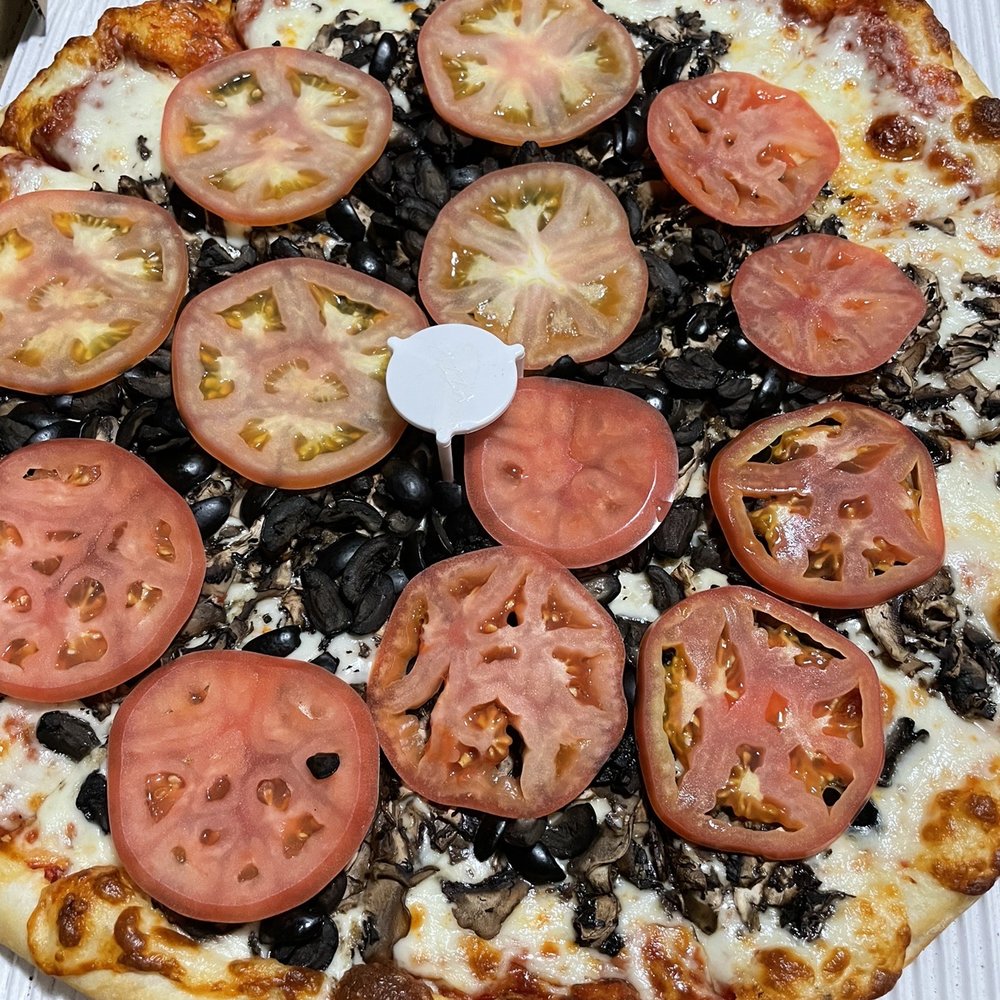 Rick's New York Style Pizza - Large thin crust mushroom, olive, and fresh tomatoes. - Pizza Near Me - Lodi, California Rick's New York Style Pizza - Large thin crust mushroom, olive, and fresh tomatoes. - Pizza Near Me - Lodi, California