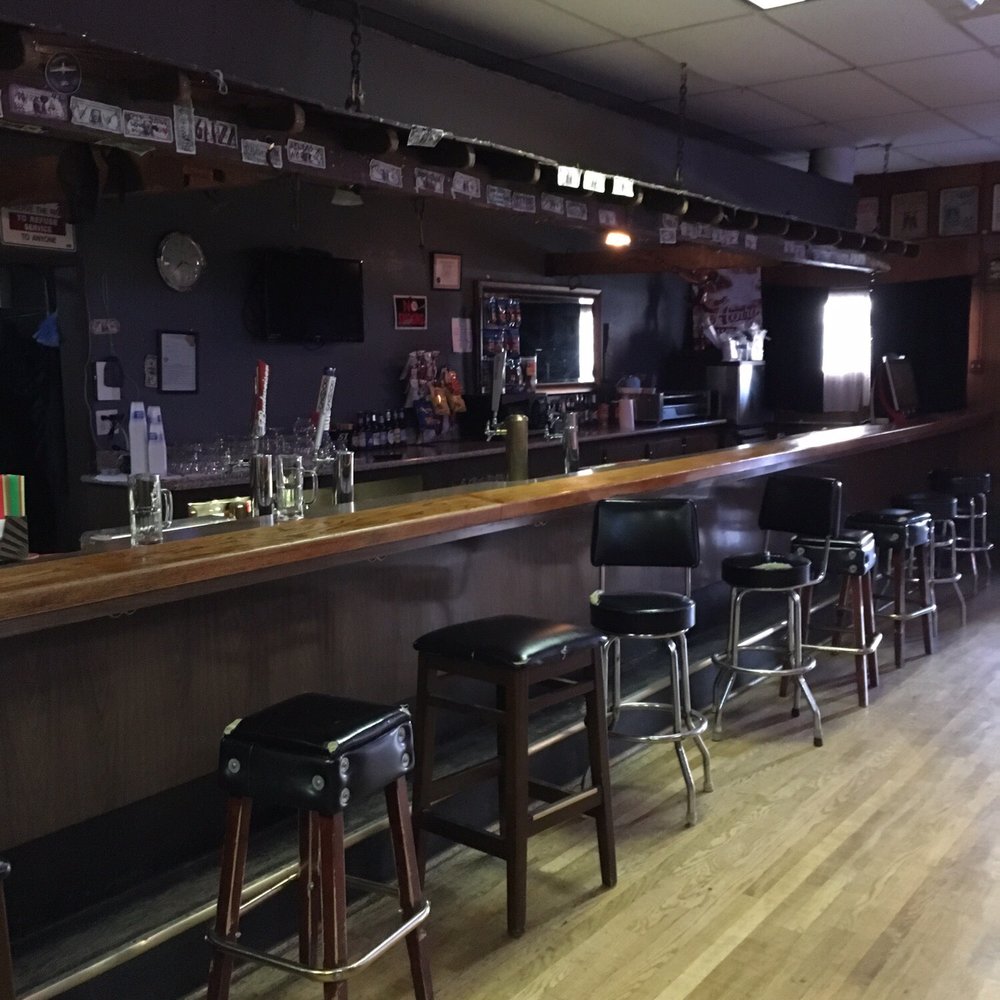 The Frontier Club - a bar with stools and a television - Sports Bars Near Me - Patterson, California