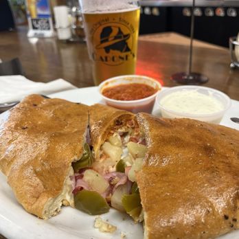 Capone's Pizza - Food was delicious Canadian bacon, bacon, jalapeño, pineapple calzone And an ice cold space dust - Pizza Near Me - Riverside, California Capone's Pizza - Food was delicious Canadian bacon, bacon, jalapeño, pineapple calzone And an ice cold space dust - Pizza Near Me - Riverside, California