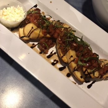 Mellow Mushroom - Bruschetta (feta on the side) with balsamic drizzle. - Pizza Near Me - Huntsville, Alabama Mellow Mushroom - Bruschetta (feta on the side) with balsamic drizzle. - Pizza Near Me - Huntsville, Alabama