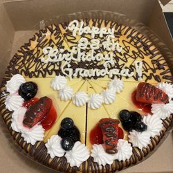 Bavarian Bakery Enterprises - I asked for half decorated in chocolate and half with berries and then the writing!! It turned out perfect.