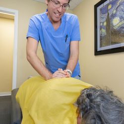 Shenandoah Chiropractic - Dr Mark Harrington manual adjustment on back at Shenandoah Chiropractic  in Davie Florida