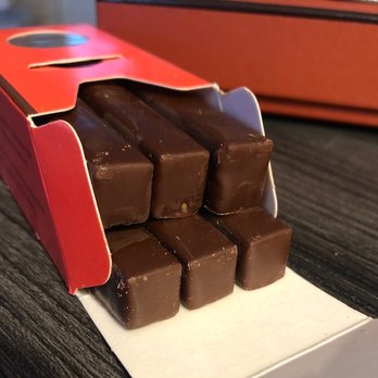 La Maison Du Chocolat - Madison Ave - You really can't stop at just one of these praline Praline Choco Sticks!  Hazelnut Praline with slivers of biscuits. - Chocolatiers & Shops Near Me - New York, New York