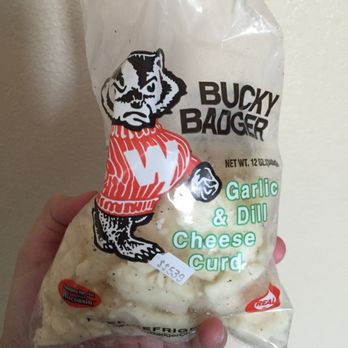 Triangle Market - a hand holding a bag of cheese - Grocery Near Me - Madison, Wisconsin Triangle Market - a hand holding a bag of cheese - Grocery Near Me - Madison, Wisconsin