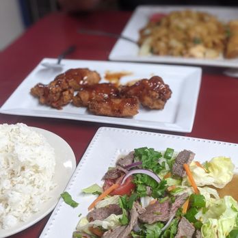 Thai Noodle Place - Thai beef salad, tamarind crispy chicken wings and drunken noodles with shrimp. - Thai Near Me - Mary Esther, Florida Thai Noodle Place - Thai beef salad, tamarind crispy chicken wings and drunken noodles with shrimp. - Thai Near Me - Mary Esther, Florida