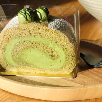 Tsujiri - a slice of cake on a plate with a fork - Desserts Near Me - Halifax, Nova Scotia