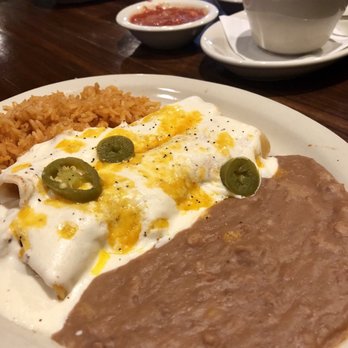 El Vecino - Sour cream chicken enchiladas with beans & rice - Tex-Mex Near Me - Dallas, Texas El Vecino - Sour cream chicken enchiladas with beans & rice - Tex-Mex Near Me - Dallas, Texas