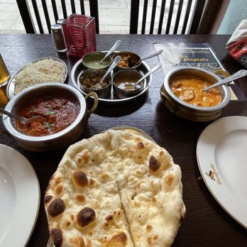Mughal - Delish! Chicken Chili Masala and Butter Chicken with rice and naans. - Indian Near Me - London, XGL