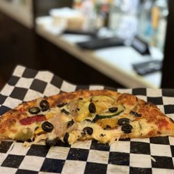 Palisades Eatery - Veggie pizza, after we ate half. :) it had a crispy crust and was perfectly cooked. No complaints.