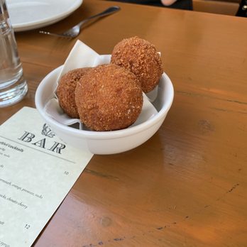 Bar Del Corso - Unopened risotto ball - Italian Near Me - Seattle, Washington Bar Del Corso - Unopened risotto ball - Italian Near Me - Seattle, Washington