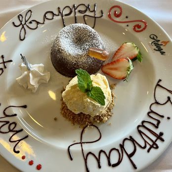 Adega Gaucha - Petit Gateau which was a warm chocolate lava cake served with vanilla ice cream. So delicious!! - Steakhouses Near Me - Kissimmee, Florida Adega Gaucha - Petit Gateau which was a warm chocolate lava cake served with vanilla ice cream. So delicious!! - Steakhouses Near Me - Kissimmee, Florida
