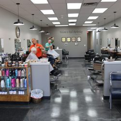 Reid's Barber Shop - Hard at work and having a great time!