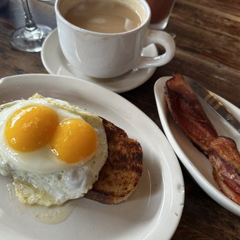 Toast - Toast with Avocado and Sunny Eggs with a side of bacon and a latte. All absolutely wonderful! - Breakfast & Brunch Near Me - New Orleans, Louisiana Toast - Toast with Avocado and Sunny Eggs with a side of bacon and a latte. All absolutely wonderful! - Breakfast & Brunch Near Me - New Orleans, Louisiana