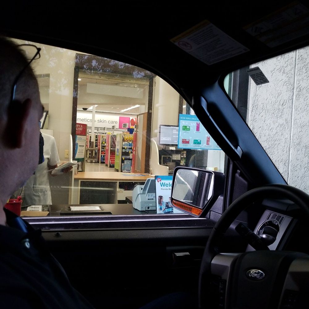 Walgreens - a man sitting in a car looking out the window - Drugstores Near Me - Miami, Florida Walgreens - a man sitting in a car looking out the window - Drugstores Near Me - Miami, Florida