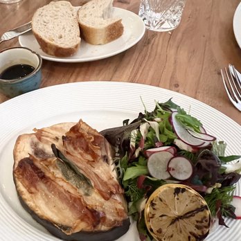 LUCA - a plate of food on a wooden table - Italian Near Me - Stony Brook, New York