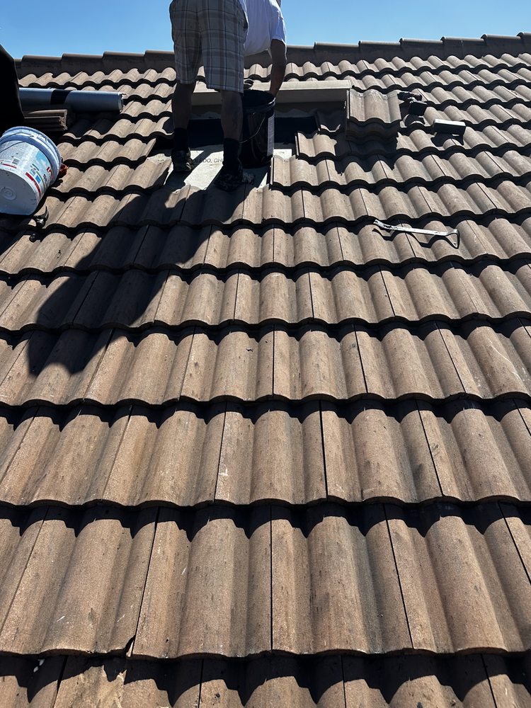 Slide of Tropical Roofing Services