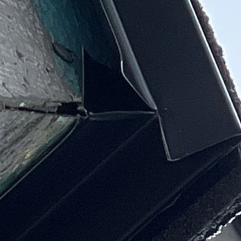 Insurance Claims Roofing - Poor workmanship on drip edge corners/ missing kick out flashing and critical points. Reused old flashing. - Roofing Near Me - Post Falls, Idaho