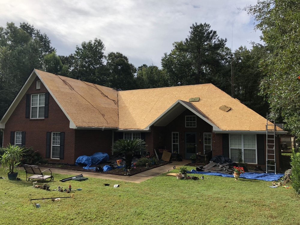 Slide of All About Roofing & Construction