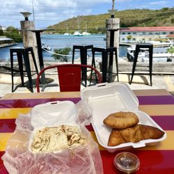 The Roti King - Goat Roti, beef pate and Johnny cake