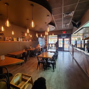 The Local Press - Nice-size indoor dining area with adequately spaced apart tables. - Salad Near Me - Park, New York The Local Press - Nice-size indoor dining area with adequately spaced apart tables. - Salad Near Me - Park, New York