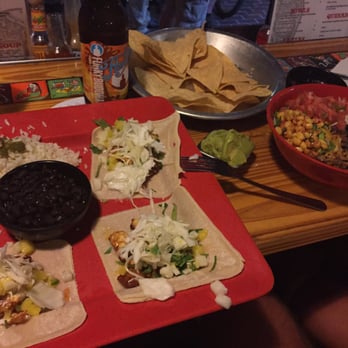 Amigos - Fish tacos, chips and salsa, and chicken bowl - Mexican Near Me - Key West, Florida