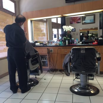 Paul's Barber Hairstyling - Master at work - Barbers Near Me - Honolulu, Hawaii