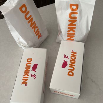 Dunkin' - three boxes of dunkin donuts on a table - Donuts Near Me - Marvin, North Carolina Dunkin' - three boxes of dunkin donuts on a table - Donuts Near Me - Marvin, North Carolina