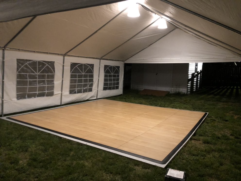Tent 20x30 with dance floor at evening event