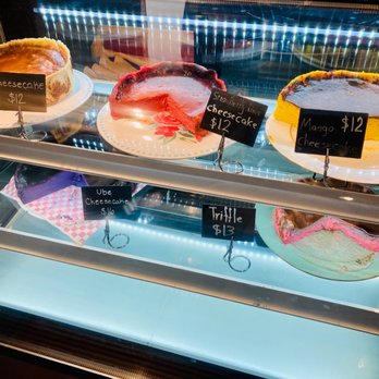 Madrigal - Dessert case with homemade cheesecakes which all looked tasty - Pizza Near Me - Columbia, South Carolina