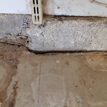 Epoxy Power by BMI - Before: Cracks in concrete letting rats and snakes in the garage. - Flooring Near Me - Calabasas, California