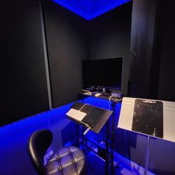 Monet Studios - Sound Booth - Engineer Area.  

Full soundproofing, adjustable lighting - color and brightness.