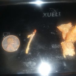 Chen's House - Chicken bone that stabbed my gums found inside a piece of general tso chicken.