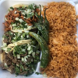 Two carne Asada tacos, one adobada and rice w/ side of fried seranos Two carne Asada tacos, one adobada and rice w/ side of fried seranos