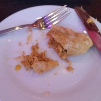Sofrito New York - chicken empanada, sorry i took a bite first - Latin American Near Me - New York, New York