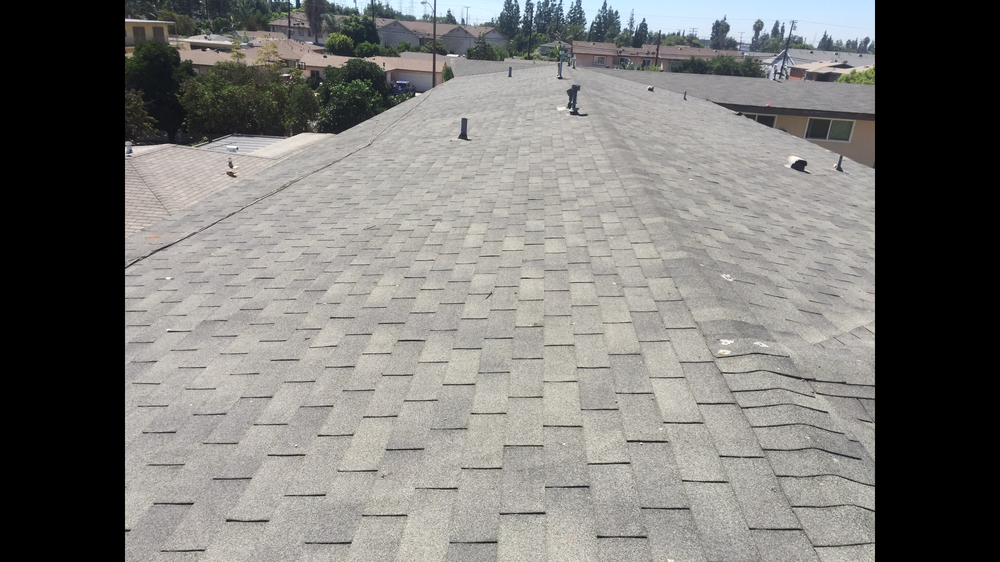 Slide of Ruiz Roofing Construction