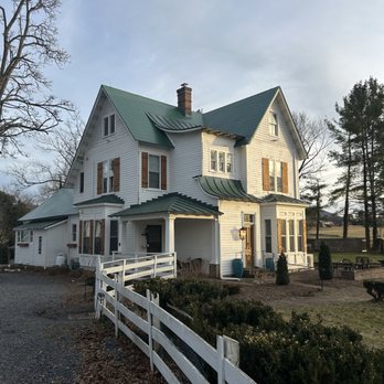 Stone House Construction - Berridge metal shingles and metal panels in Forest Green - Roofing Near Me
