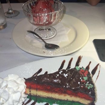 Chop Shop Bar & Grill - Raspberry Sorbet and Rainbow Cookie Cake - New American Near Me - Smithtown, New York Chop Shop Bar & Grill - Raspberry Sorbet and Rainbow Cookie Cake - New American Near Me - Smithtown, New York